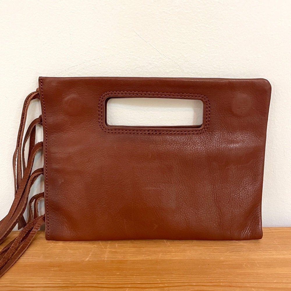 Hobo The Original Leather Clutch with fringe.